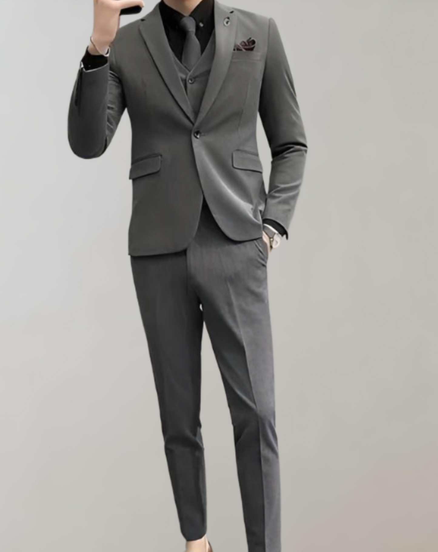 3 piece set of men's single breasted business suit with a notched collar combined with formal trousers with pockets